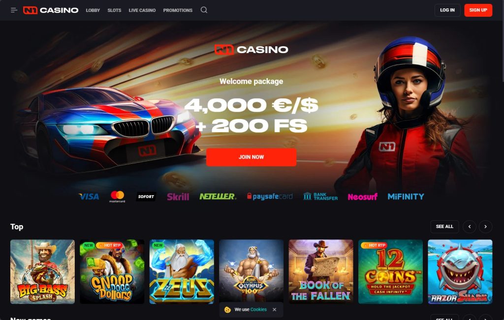 Screenshot of N1 Casino homepage showing a race car and a female driver in a helmet, with the text “4,000 €/$ + 200 FS” on a dark background.