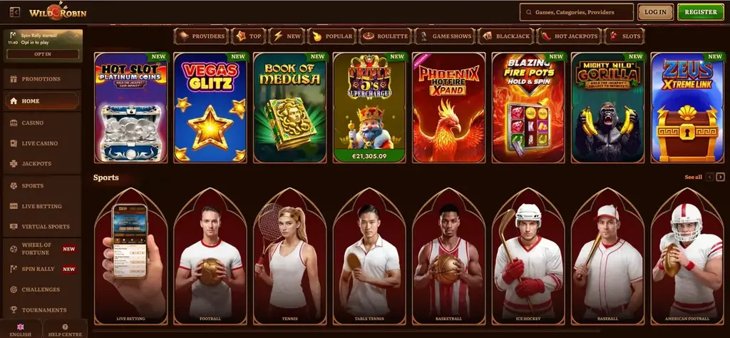 Wild Robin Casino homepage displaying slot games, live casino categories, and sports betting sections.